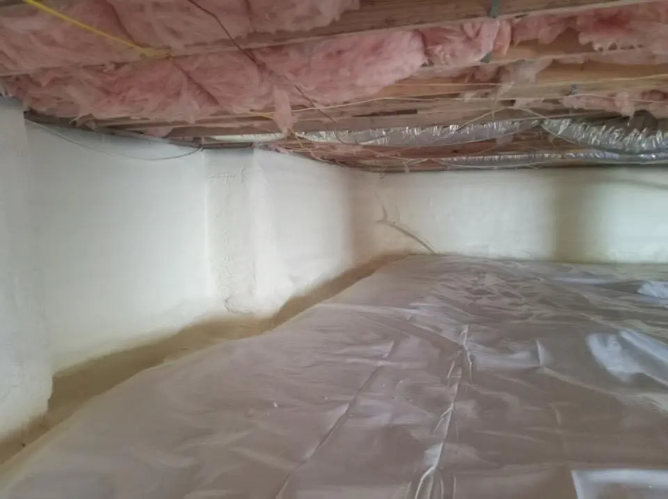Crawl space encapsulation with closed-cell spray foam for Commercial Roof Restoration in Edinburg